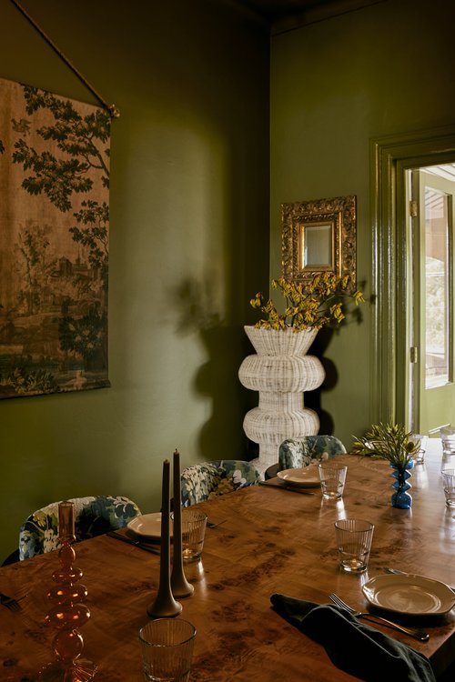 Golden and green tapestry hanging on wall in private dinging space at a newly completed Sydney Italian restaurant