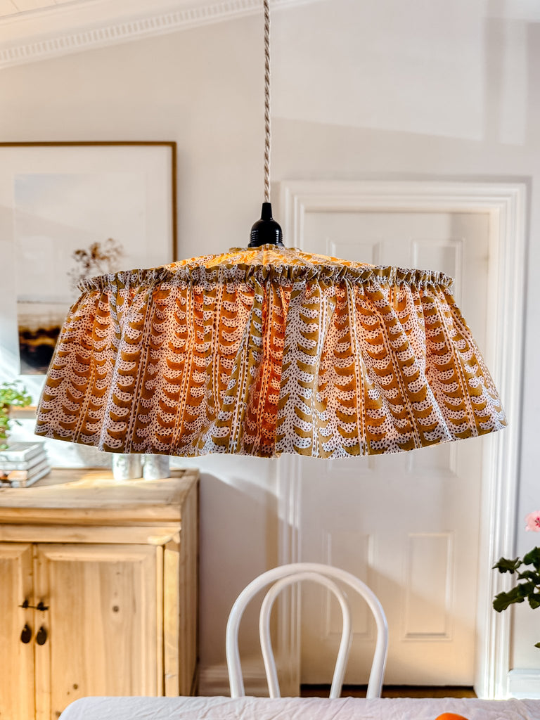 yellow block print pendant light with ruffle